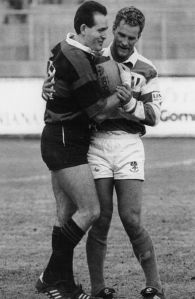 Michael Lynagh and David Campese share a joke in October 1992 during a Super 10 game between Amatori Milano and Benetton Treviso.