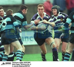 Mark Egan taking ball on for Terenure against Eddie Halvey of Shannon in the AIL during 1997, after his return from Japan. Egan had been an Irish U25 representative at one time, and gave up his chance at a full cap to move to Japan and further his career. [Photo credit: James Meehan at INPHO]
