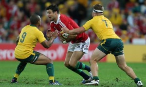 Mike Phillips getting tackled by Will 'Genius' Genia and Michael 'Centre' Hooper. This happened a good bit, but normally it was Ben Mowen putting the skids on things. 